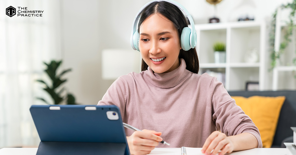 Asian female student studying online webinars or courses at home